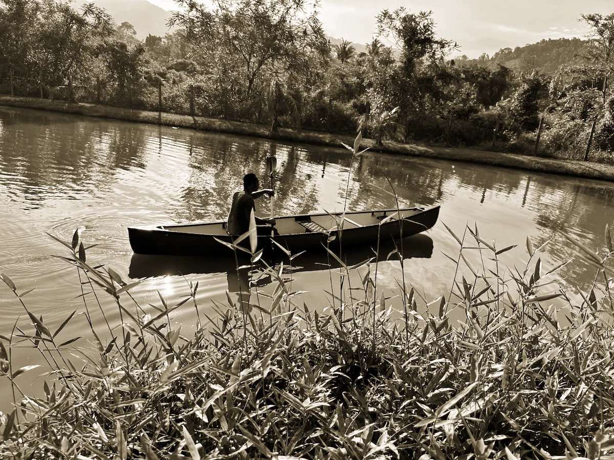 Canoe on the river beside Laman Tamara