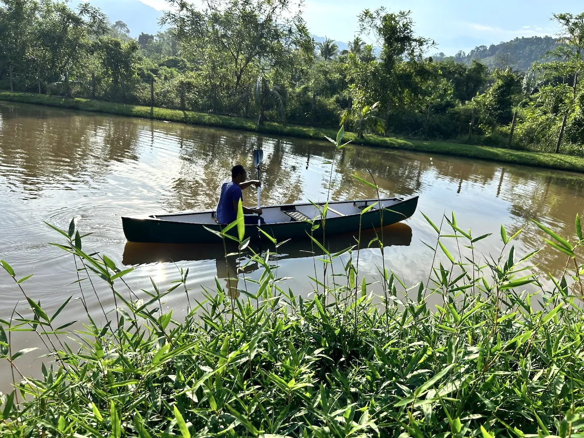 Canoe on the river beside Laman Tamara